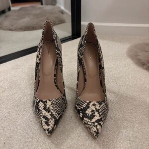 Aldo Black and Cream Snakeskin Heels